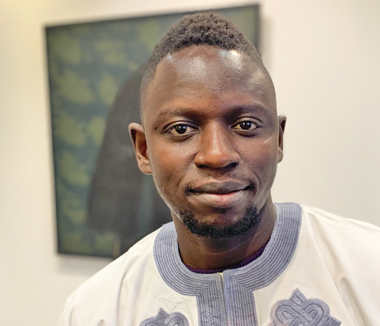 Oluwole Omofemi talking to Studio International at the opening of The Way We Were at Signature African Art, London, 10 March 2020. Photo: Martin Kennedy.