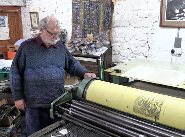 Nicolas McDowall in the print studio at their home in Monmouthshire. Photograph: Martin Kennedy.