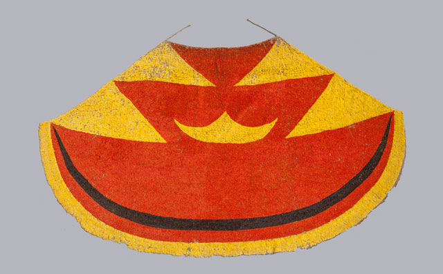 Ahu ula (feather cloak) belonging to Liholoho, Kamehameha II., early 19th century. Feathers, fibre, painted barkcloth (on reverse), 207 cm. Museum of Archaeology and Anthropology, University of Cambridge .