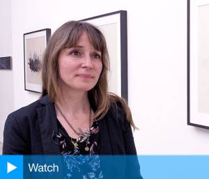 Miriam de Búrca talking to Studio International at the opening of Protest and Remembrance, Alan Cristea Gallery, London. Photo: Martin Kennedy.