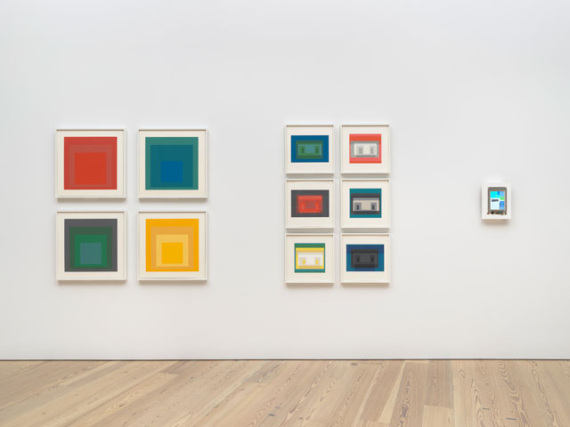 Installation view of Programmed: Rules, Codes, and Choreographies in Art, 1965-2018 (Whitney Museum of American Art, New York, September 28, 2018-April 14, 2019). From left to right, top to bottom: Josef Albers, Homage to the Square V, 1967; Josef Albers, Homage to the Square IX, 1967; Josef Albers, Homage to the Square XII, 1967; Josef Albers, Homage to the Square X, 1967; Josef Albers, Variant V, 1966; Josef Albers, Variant VI, 1966; Josef Albers, Variant X, 1966; Josef Albers, Variant IV, 1966; Josef Albers, Variant II, 1966; Josef Albers, Variant VII, 1966; John F. Simon Jr., Color Panel v1.0, 1999. Photograph by Ron Amstutz.