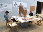 Visitors immersed in content. Installation view, Renzo Piano: The Art of Making Buildings, Royal Academy of Arts, London. Photo: Veronica Simpson.