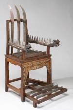 Torture chair. Wood with 12 steel blades, Chinese, 18th-19th century. 
        The Science Museum 