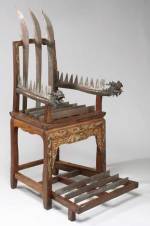 Torture chair. Wood with 12 steel blades, Chinese, 18th-19th century. 
        The Science Museum 