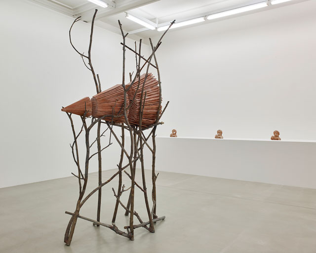 Foreground: Giuseppe Penone, Ombra di terra, 1999. Three parts; bronze and terracotta, 283 x 176 x 104 cm. Background: Giuseppe Penone, Three from Corteccia, 1976. Terracotta, green enamel, 27 x 25 x 22 cm. Courtesy of Marian Goodman Gallery.