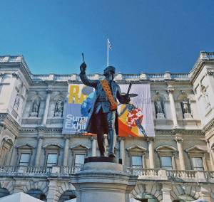 Alfred Drury’s statue of Sir Joshua Reynolds PRA in the courtyard of the Royal Academy of Arts wears a sash of Dutch wax print. Photo: William Kennedy.