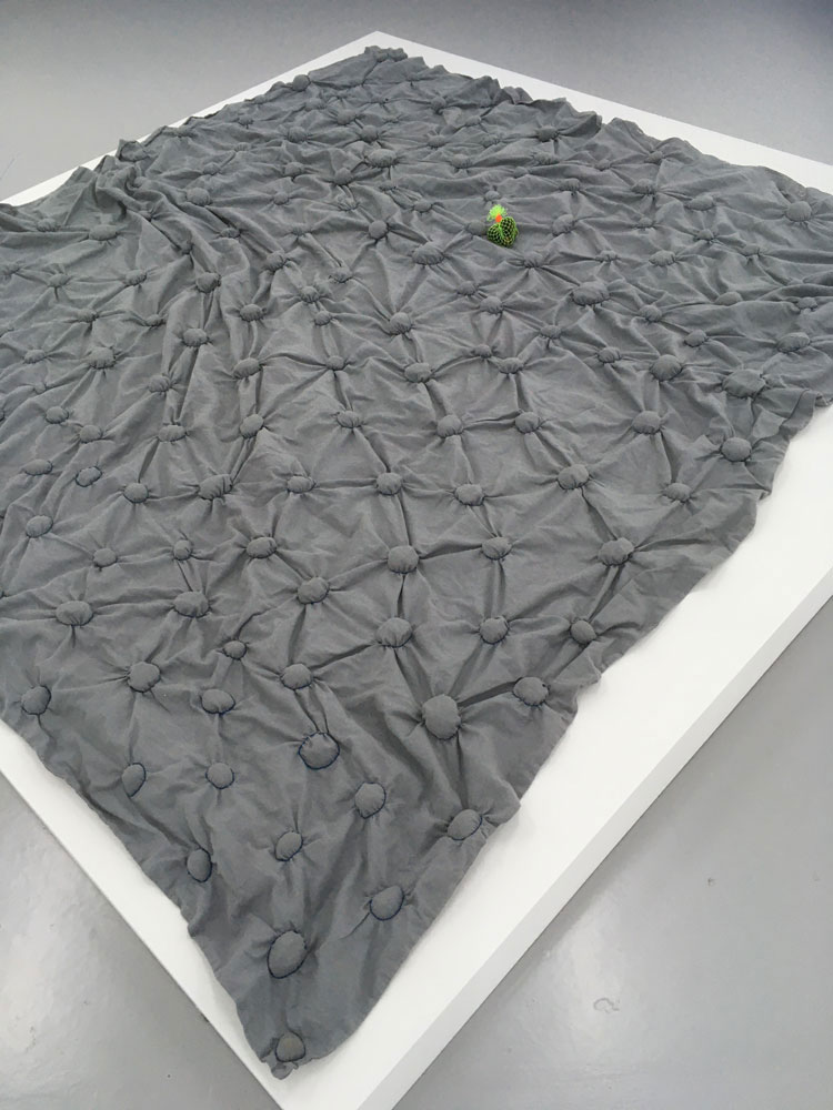 Veronica Ryan. Tidal, 2020. Fabric, avocado stones, thread. 180 x 183 x 5 cm.