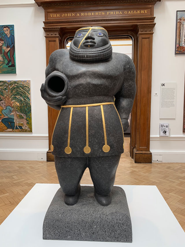 Benedict Byrne, The Scarred One, Limestone, 215 x 90 x 65 cm. Installation view, Royal Academy of Arts. Photo: Martin Kennedy.