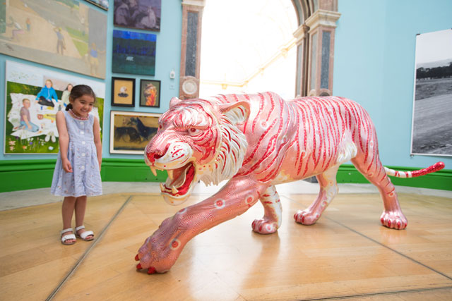 Installation view of David Mach, Easy Tiger – Mach Brothers in Wohl Central Hall. Resin and foil, 115 x 55 x 286 cm. Photo: © David Parry/ Royal Academy of Arts.