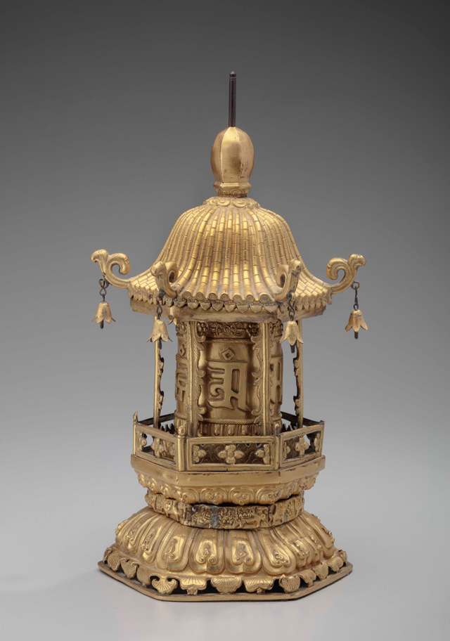 Table-top prayer wheel (mani ‘khor lo), Tibet, 19th or early 20th century. Gilded copper-alloy, paper, ink. Newark Museum; Newark Museum Bequest of Edward N. Lippincott. Photo © The Newark Museum.