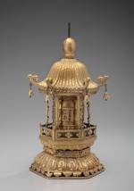Table-top prayer wheel (mani ‘khor lo), Tibet, 19th or early 20th century. Gilded copper-alloy, paper, ink. Newark Museum; Newark Museum Bequest of Edward N. Lippincott. Photo © The Newark Museum.