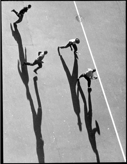 Harold Corsini. <em>Playing Football</em>, c1939. From <em>Harlem Document</em>, 1936–40. Gelatin silver print. George Eastman House, International Museum of Photography and Film, Rochester, New York, Gift of Aaron Siskind. © Estate of Harold Corsini.