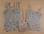Erna Van Sambeek, <em>Body Warmers for a Poor Family</em>, 2006. Newspapers (Financial Times and Financieel Dagblad) cut into 3/8-inch strips and knitted to several sizes. Largest: approx. 26 x 31 ½ in. (66 x 80 cm). Collection of the artist. Photo: Ilse Schrama
