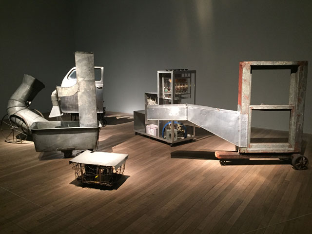 Robert Rauschenberg. Oracle, 1962-5. Five-part found-metal assemblage with five concealed radios: ventilation duct, automobile door on typewriter table, with crushed metal; ventilation duct in washtub and water, with wire basket; constructed staircase control unit housing batteries and alect
236 x 450 x 400 cm. Musée national d’art modern, Centre George Pompidou. Photograph: Martin Kennedy.