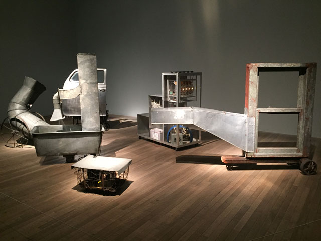 Robert Rauschenberg. Oracle, 1962-5. Five-part found-metal assemblage with five concealed radios: ventilation duct, automobile door on typewriter table, with crushed metal; ventilation duct in washtub and water, with wire basket; constructed staircase control unit housing batteries and alect
236 x 450 x 400 cm. Musée national d’art modern, Centre George Pompidou. Photograph: Martin Kennedy.