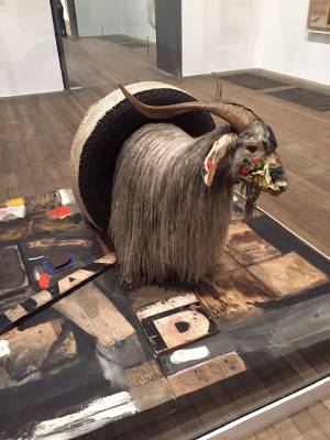 Robert Rauschenberg. Monogram, 1955-59. Oil paint on taxidermied angora goat and rubber tire, on oil paint on paper, fabric printed paper, printed reproductions, metal, wood, rubber shoe heel, and tennis ball on canvas on wood platform mounted on four casters, 129 x 186 x 186 cm. Moderna Museet, Stockholm. Photograph: Martin Kennedy.