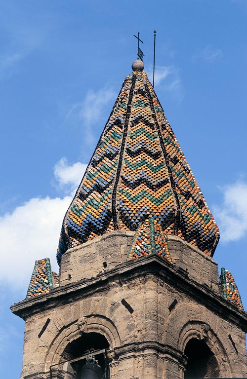 The campanile of the church of Cristo dell'Olmo at Mazzarino, covered with majolica tiles. Photograph by Melo Minnella