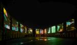 Clifford Ross. Nighttime view of immersive Harmonium Mountain video. Courtyard D. MASS MoCA.