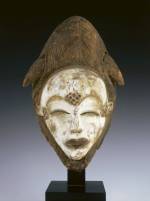 Punu face mask (mukudj). Gabon, date unknown. Wood, kaolin, and pigment. 12 1⁄2 in. (31.8 cm) high. Courtesy of The Kreeger Museum, Washington, DC