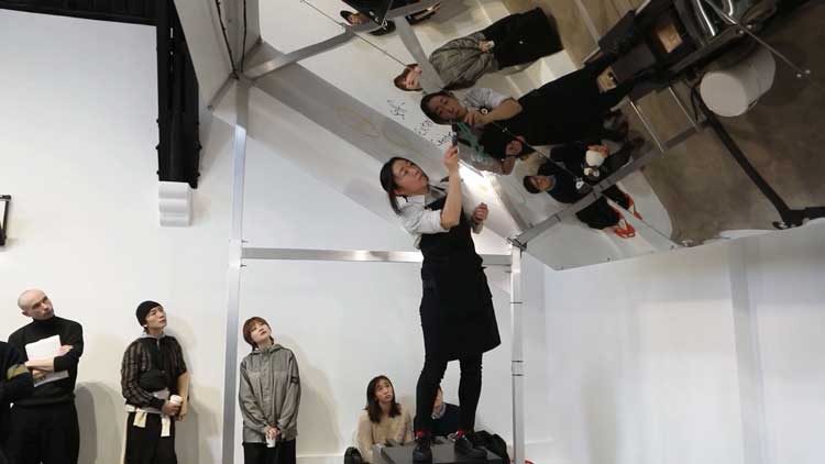 Aki Sasamoto, Grilled Diagrams, Performance, February 2026. Video still. Courtesy of the artist and Studio Voltaire. Video: Dor Even Chen.