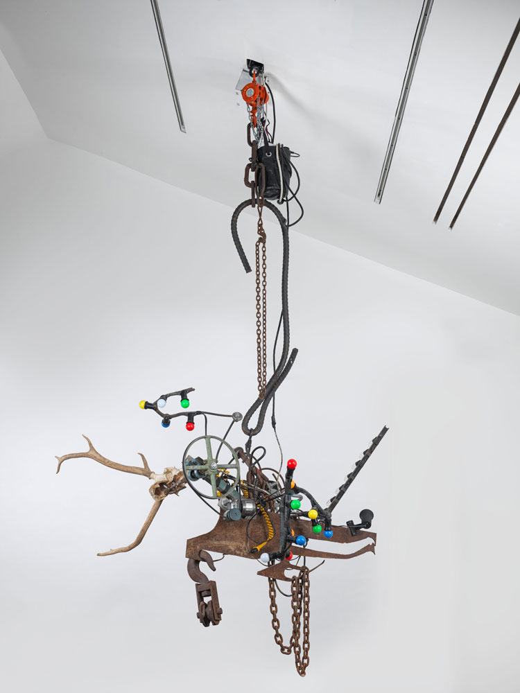Jean Tinguely, Chandelier, 1989-90. Metal, plastic components, antlers, colored light bulbs, 254 x 172.7 x 152.4 cm (100 x 68 x 60 in). Installation view, Hauser & Wirth Somerset, 2025. © Niki Charitable Art Foundation. All Rights Reserved, DACS 2025. © Jean Tinguely, DACS 2025. Photo: Ken Adlard. Courtesy the artists and Hauser & Wirth.