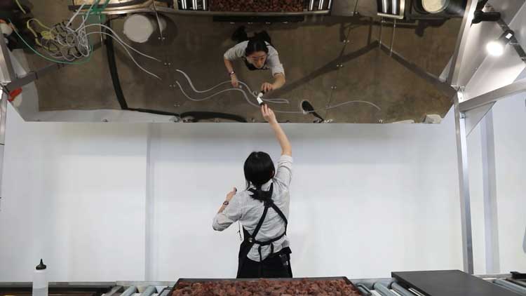 Aki Sasamoto, Grilled Diagrams, Performance, February 2026. Video still. Courtesy of the artist and Studio Voltaire. Video: Dor Even Chen.