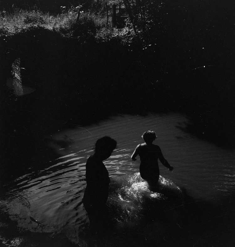 Eileen Agar. Photograph of Catherine de Villiers and Princess Dilkusha de Rohan getting into a river in Sussex for a swim, 1941. Black and white print.
Tate Archive: Presented to Tate Archive by Eileen Agar in 1989 and transferred from the photograph collection in 2012. © Tate.