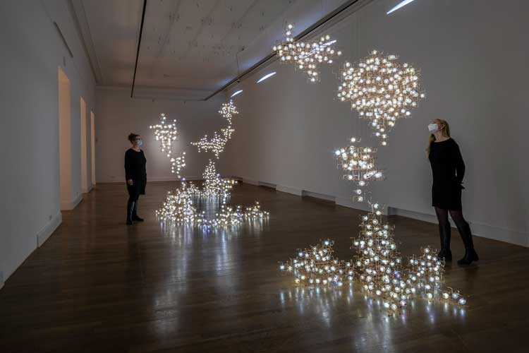 Studio Drift. Fragile Future III, 2005. Light sculpture, phosphor bronze, dandelions, LED, electronics. Photo: Henning Rogge.