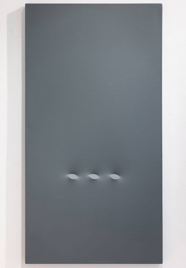 Turi Simeti. Tre ovali in grigio, 1980. Acrylic on shaped canvas, 67 x 35 ½ in (170 × 90 cm). Image courtesy The Mayor Gallery.