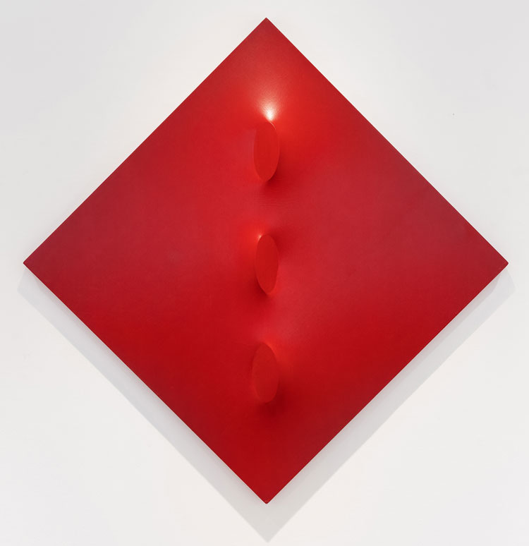 Turi Simeti. Tre ovali in rosso, 1967. Oil on shaped canvas, 47 ¼ x 47 ¼ in (120 x 120 cm). Image courtesy The Mayor Gallery.
