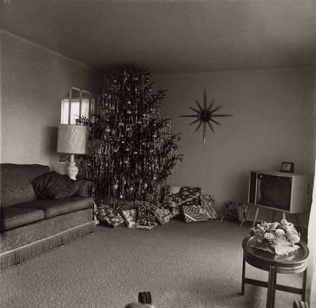 Diane Arbus. Xmas Tree in a Living Room, in Levittown 1963, 1963. Photograph, gelatine silver print on paper. 36.8 x 37.6 cm. ARTIST ROOMS National Galleries of Scotland and Tate. Acquired jointly through The d'Offay Donation with assistance from the National Heritage Memorial Fund and the Art Fund 2008. © The Estate of Diane Arbus.