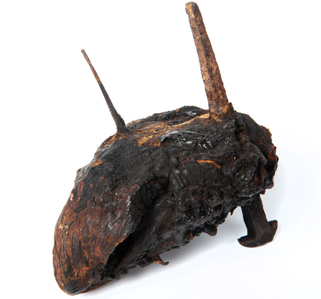 Bull’s heart pierced with iron nails and thorns. Found in a chimney at Shutes Hill Farm, Somerset, date unknown, 13 x 9 cm. © Pitt Rivers Museum, University of Oxford.