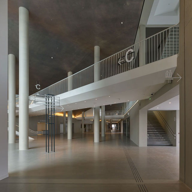 The public street gives vistas onto the life of the building. Photograph: Didier Boy de la Tour.