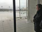 Shigeru Ban looks out onto the sculpture garden, which sits at the building’s north end, still awaiting its final pieces. Photograph: Didier Boy de la Tour.