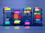 David Batchelor. Brick Lane Remix I, 2003. Shelving Units, found light boxes, fluorescent light, vinyl, acrylic sheet, cable, plugboards, 204 x 435 x 38 cm. Courtesy the Saatchi Gallery, London. © David Batchelor, 2011.