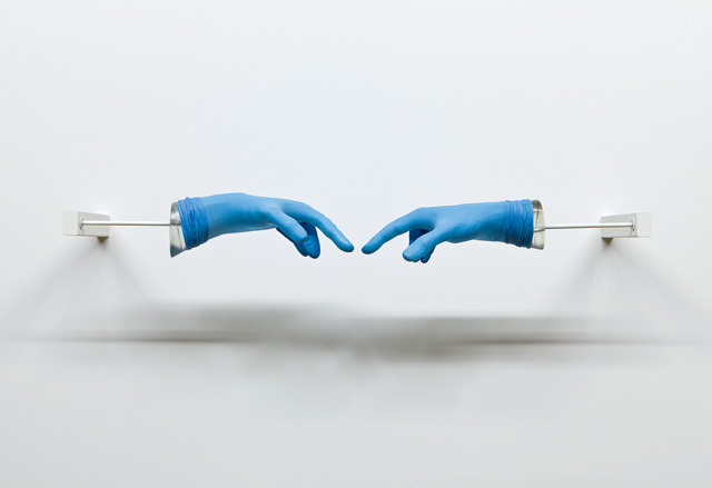 Anri Sala. Title Suspended (Sky Blue), 2008. Resin, nitrile rubber gloves, and electric motor, 7 7/8 x 31 1/2 x 7 7/8 in (20 x 80 x 20 cm). © Anri Sala. Courtesy Hauser & Wirth.