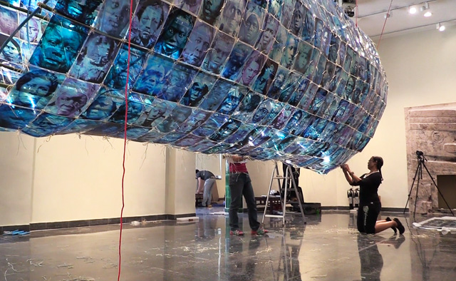 Toni Scott working on Slave Ship (Remembering the Forgotten), part of DNA – Bloodlines and the Family of Mankind, Arthur M Sackler Museum of Art and Archaeology at Peking University, 6 July 2015. Photo: Martin Kennedy.