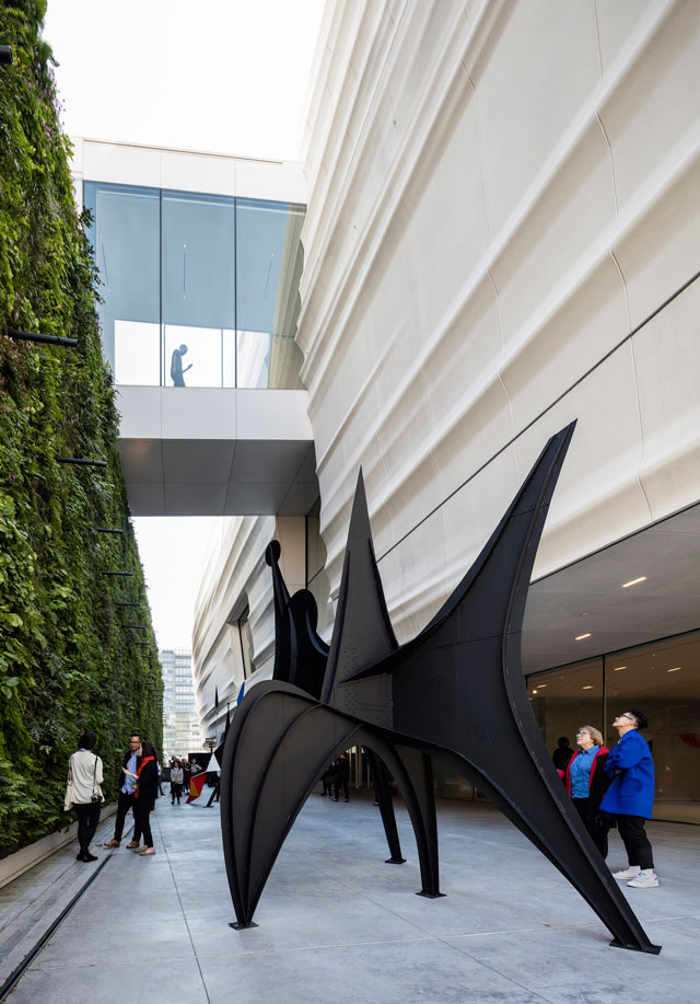 Pat and Bill Wilson Sculpture Terrace featuring Alexander Calder’s sculpture Maquette for Trois Disques (Three Disks), formerly Man (1967) and the living wall, designed by Habitat Horticulture. Photograph: © Henrik Kam, courtesy SFMOMA.