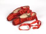 Freed of London (founded in 1929). Red ballet shoes made for Victoria Page (Moira Shearer) in The Red Shoes (1948). Silk satin, braid and leather, England, 1948. Photograph reproduced with the kind permission of Northampton Museums and Art Gallery.