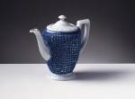 Droog Design. <em>Coffeepot, Knitted Maria. </em>Gijs Bakker, 1997 23 x 11 x 11 cm. Porcelain, glaze. Collection Droog Design. Photo: Hans van der Mars.