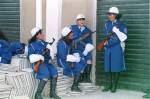 Zohra Bensemra. <em>Law-and-order enforcement officers at the Ain Benian police school in Algiers, on the day of graduation of the new self-defence and close combat squad, January 27, 1999</em>. C-print, 11 x 14 in. (27.9 x 35.6 cm) © Zohra Bensemra. Courtesy of the artist.