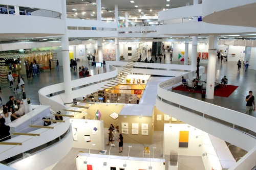 Overview of the Ciccillo Matarazzo pavilion’s second and first floor, home to the São Paulo Biennial and SP Arte 2015. © German Alfonso Nunez.