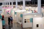 Overview of the Ciccillo Matarazzo pavilion’s ground floor, home to the São Paulo Biennial and SP Arte 2015. Detail: Solo section stands. © German Alfonso Nunez.