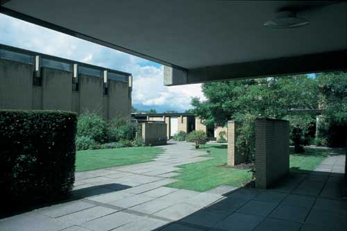 The view to the hall gives some idea of Jacobsen's 3m grid as applied to the landscaping of the college