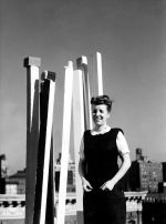 Louise Bourgeois with her sculpture THE VISITORS ARRIVE AT THE DOOR on the roof of Stuyvesant's Folly, at 142 East 18th Street, circa 1944. Photo: © The Easton Foundation / 2023, ProLitteris, Zurich.