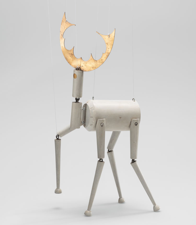 Sophie Taeuber-Arp. Stag (marionette for King Stag), 1918. Oil paint on wood; brass sheet; metallic paint on metallic paper; metal hardware, 50 x 17.8 x 18 cm. Museum für Gestaltung, Zürcher Hochschule der Künste, Zurich. Decorative Arts Collection.