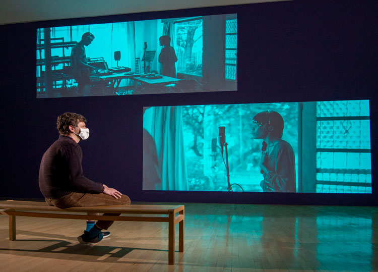 Gabrielle Goliath, This song is for ... Pat Hutchinson, 21 mins 22 secs. Unstoppable (by Sia). Performed by Nonku Phiri & Dion Monti. 2019–ongoing. Single-channel projection with dual stereo audio. Installation view, The Normal, Talbot Rice Gallery, 2021. Courtesy of Talbot Rice Gallery, University of Edinburgh. Photo: Sally Jubb.
