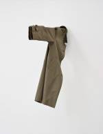 Gert Robijns. Jeun’homme, 2012. Overcoat and metal beams, 120 x 80 x 20 cm (47¼ x 31½ x 8 in). Courtesy of Tommy Simoens, Antwerp. Studio Luc Tuymans.