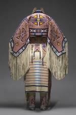 Woman’s Dress and Accessories, 2005. Jodi Gillette (1959-), Hunkpapa Lakota (Teton Sioux), North Dakota. Native tanned and commercial leather, glass and metal beads, cotton cloth, silk, dentalium shell, metal cones, horsehair, plastic, hair pipes, brass bells, porcupine quills, brass tacks, brass and metal studs, silver cones. 54 × 60 in (137.2 × 152.4 cm). United States, Courtesy of Jodi Gillette. Photograph: Joshua Ferdinand, courtesy of Jodi Gillette. (Cat.134).
