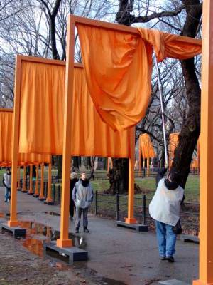 Christo. The Gates: Central Park, New York, 1979-2005, installation view, 2013. Volunteers unhooking the saffron-coloured fabric. Photo: Miguel Angel.